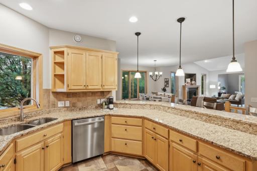 Not only is there an abundance of cabinet space but this nice open layout flows into the dining and living areas.