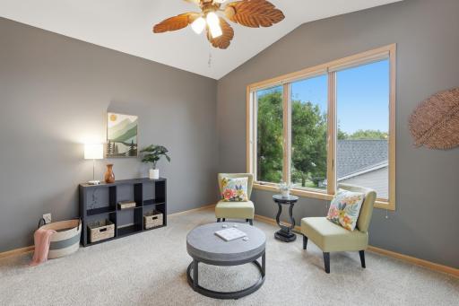 Featuring vaulted ceilings and large windows that allow an abundance of natural light.