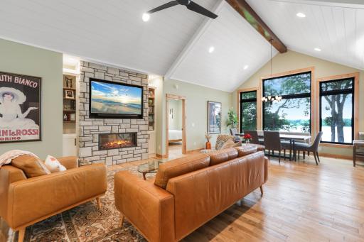 Sit back and relax by the living room fireplace, a warm and inviting focal point perfect for cozy evenings and gathering with family and friends.
