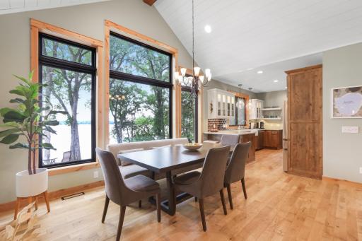The dining area flows seamlessly into the beautifully designed kitchen, creating an open and inviting space ideal for everyday living and effortless entertaining.
