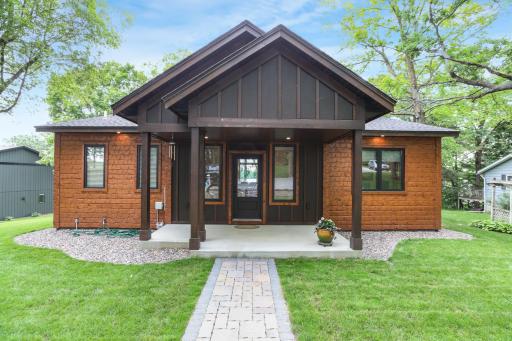Welcome home to your lakeside retreat on beautiful Bass Lake, where exceptional craftsmanship, breathtaking sunsets, and effortless lake living come together