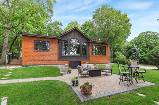 Access to the large crawl space is conveniently located from the patio, providing easy entry to additional storage and utility space.