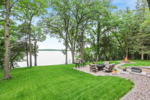 Relax and take in the breathtaking lake views from the beautifully paved patio, thoughtfully designed for outdoor living and entertaining