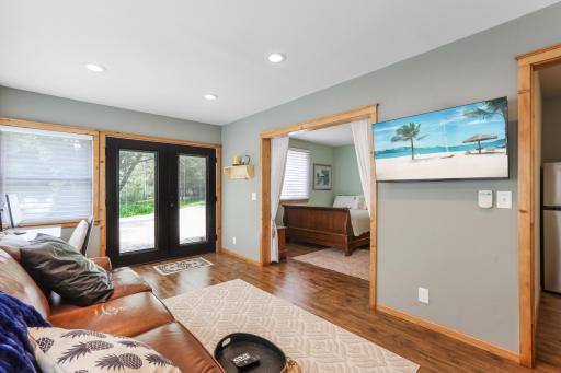 The guest cabin offers a functional living space complete with internet and TV, providing comfort and convenience for extended stays.