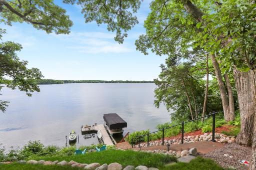 Beautiful lake views create a stunning backdrop throughout the property, offering a peaceful and picturesque setting in every season.