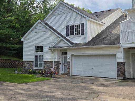 3 bedrm End Unit, Beautiful private backyard with retaining wall and mature trees.