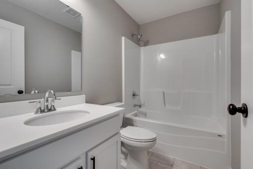 Photos are of a like(not exact) home in different location. Finishes may be different in actual home.