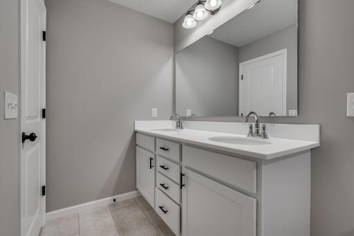 Photos are of a like(not exact) home in different location. Finishes may be different in actual home.