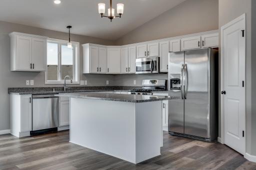 Photos are of a like(not exact) home in different location. Finishes may be different in actual home.