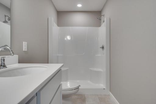 Photos are of a like(not exact) home in different location. Finishes may be different in actual home.