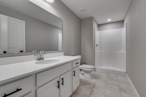 Photos are of a like(not exact) home in different location. Finishes may be different in actual home.
