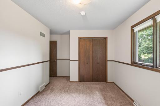 Another view of the 2nd bedroom on the main floor that looks out into the backyard.