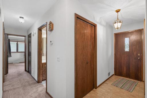 Entry and hall leading you to the bathroom and bedrooms.