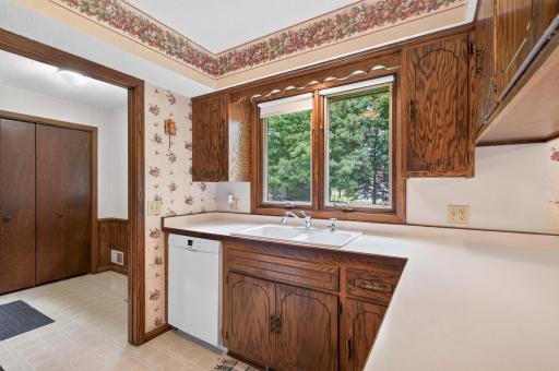 You won't mind doing the dishes while looking out into the backyard.