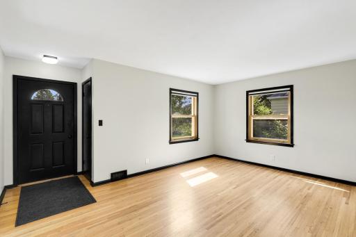 Main floor living room is spacious at 16' x 11' in size.