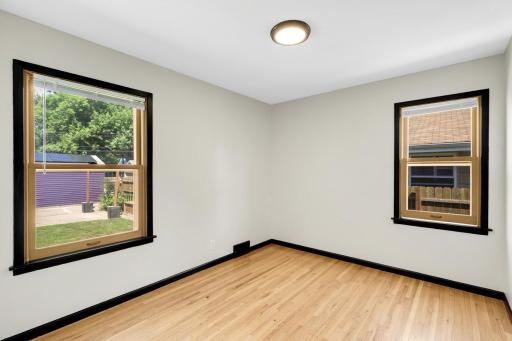 2nd bedroom on main floor is 11' x 9' and has a closet (not shown in photo).