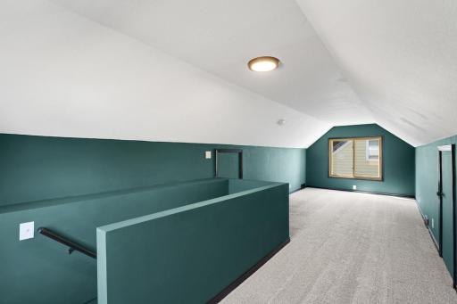 Upper level family room is large at 28' x 10' and has additional storage in dormer areas.
