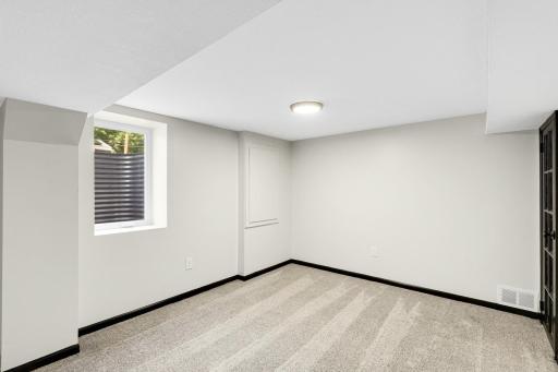 3rd bedroom on the lower level is very large at 14' x 11' in size and has a walk in closet (not shown in photo).