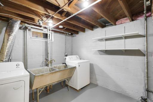 Laundry room is 10' x 10' in size and has a sink.