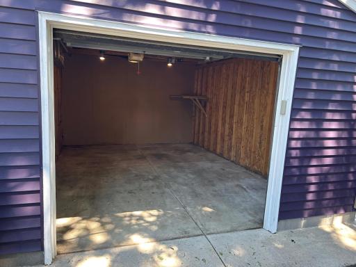 14" x 21' garage. Overhead door size is 8' wide x 7' high.