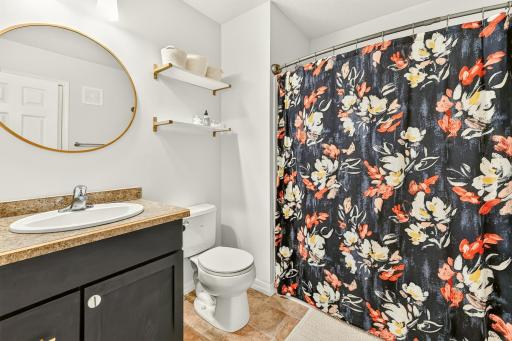 Upper level full bath with tub/shower and nice-sized vanity.
