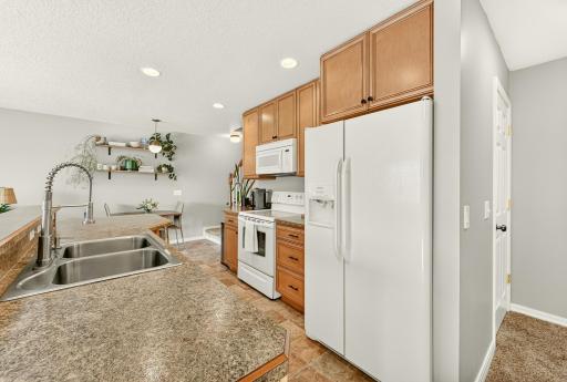 Lots of storage and light in this spacious kitchen.