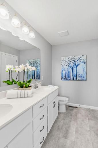 Photos are of a like(not exact) home in different location. Finishes may be different in actual home.