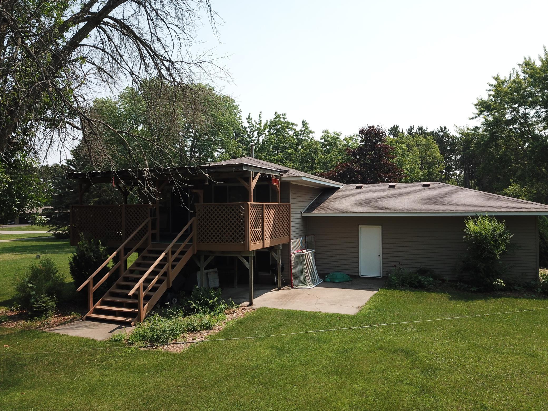 Rear of home with big covered deck