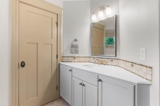 Separate vanity areas with sinks and storage
