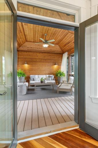 Step through the french doors into the screened porch