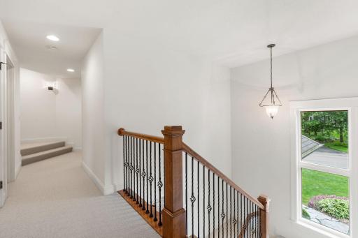 Head to the upper level to discover 4 spacious bedrooms