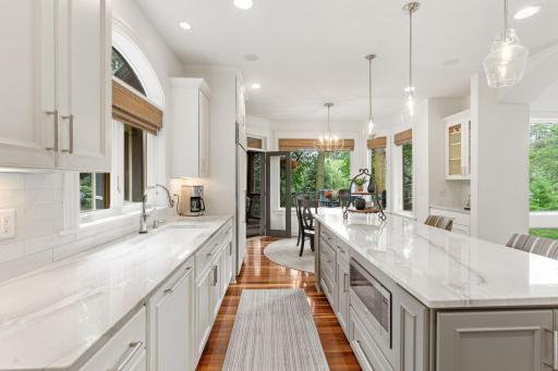 Easily access the informal dining space and screened porch