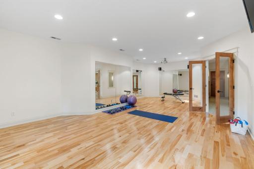 French doors lead to a grand exercise room