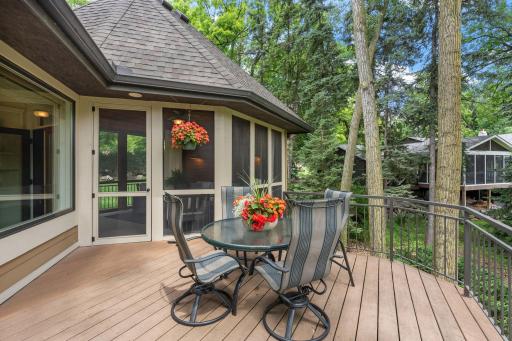 Step out to the deck from the screened porch