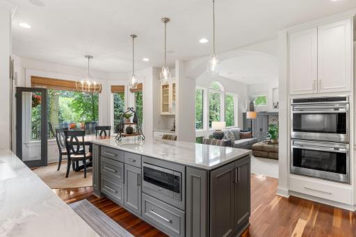 Functional center island with microwave and lots of cabinet and counter space