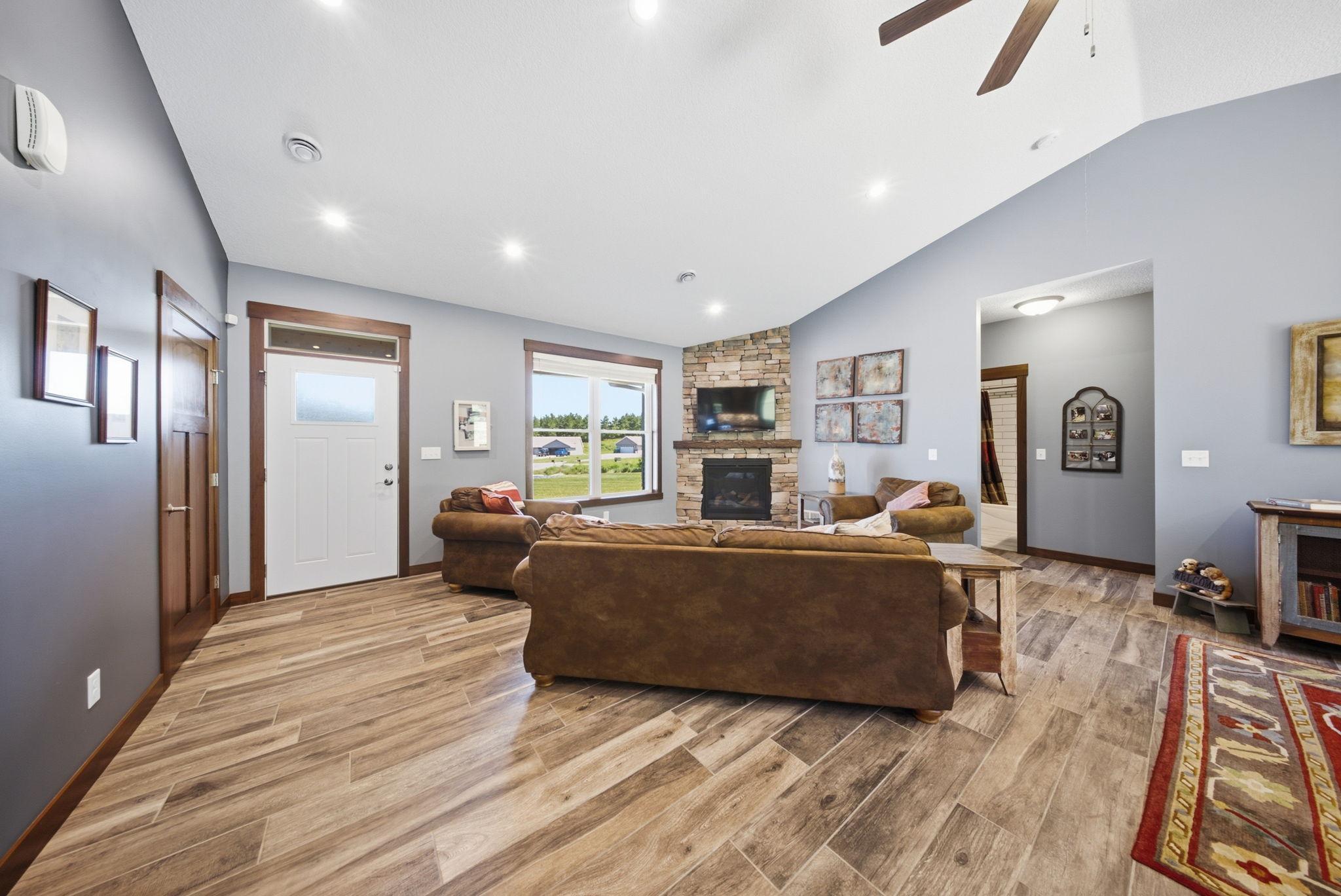 Another view of the open-concept living area showcasing the seamless flow throughout the main level.