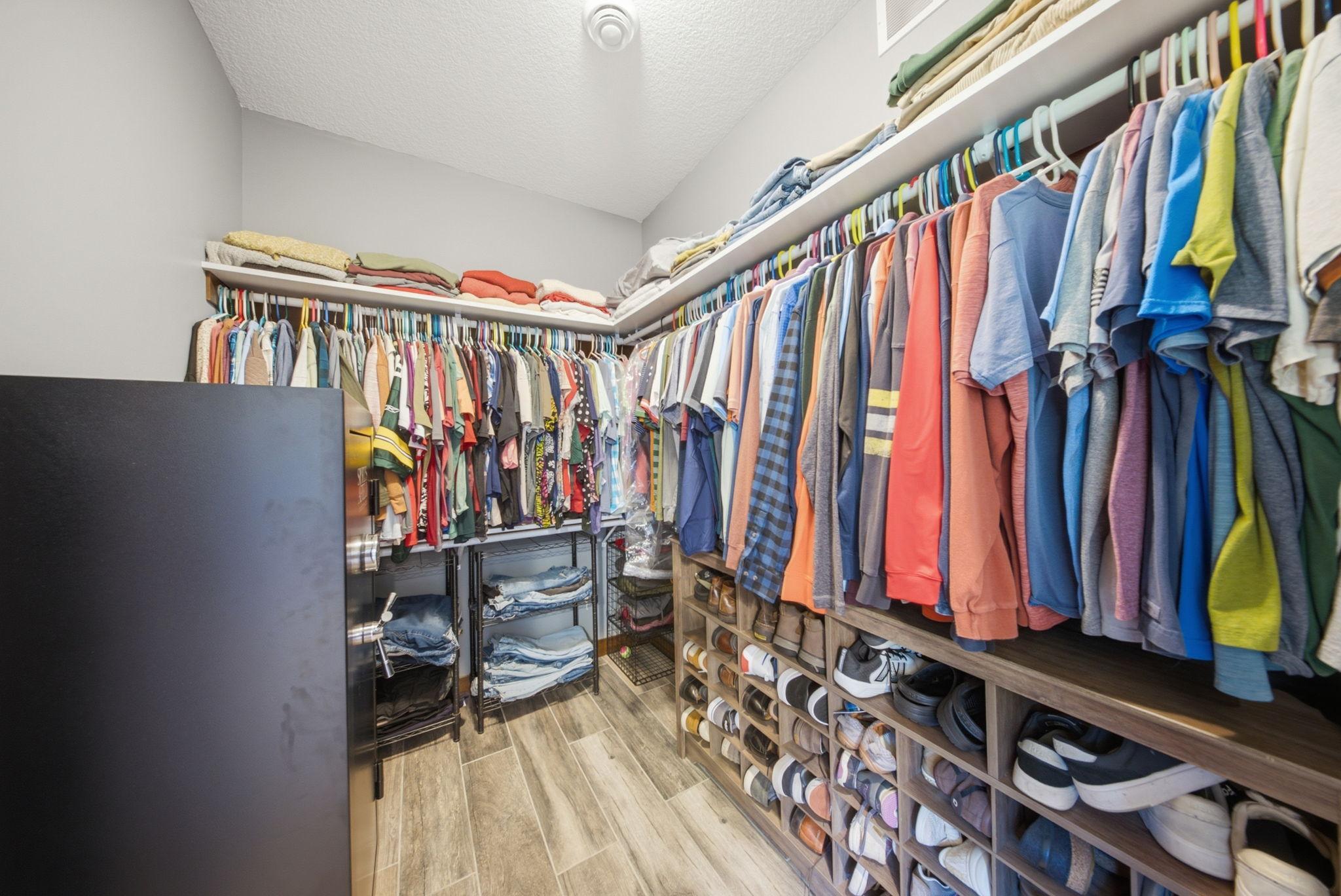 Walk-in closet provides abundant storage and organization space.
