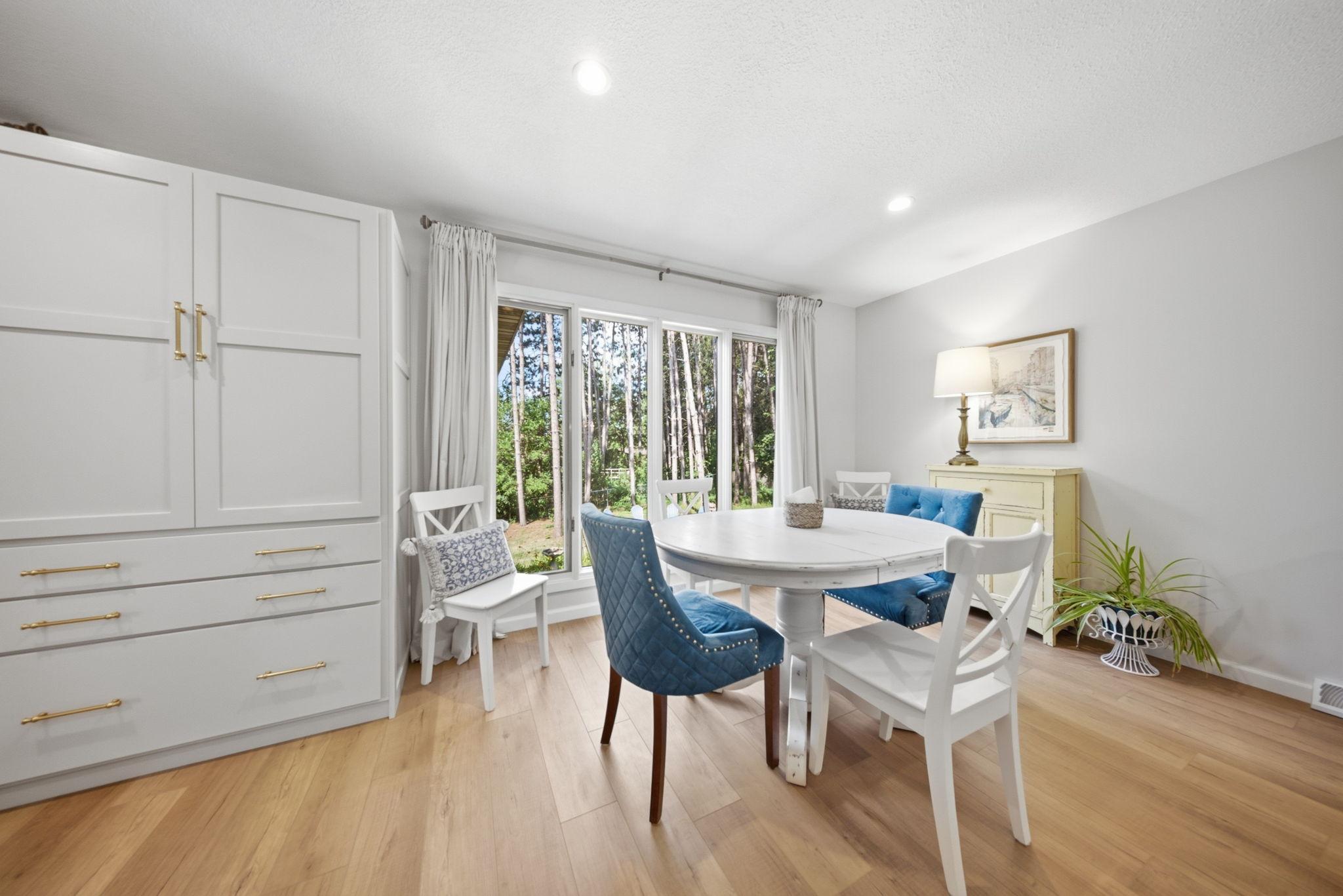 Dining area with sliding doors leading to the deck.