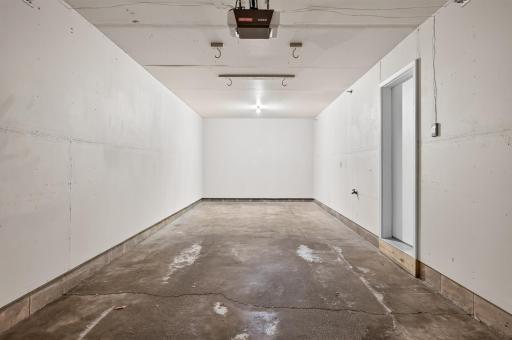 Tandem-style, double-deep garage offering space for multiple vehicles
