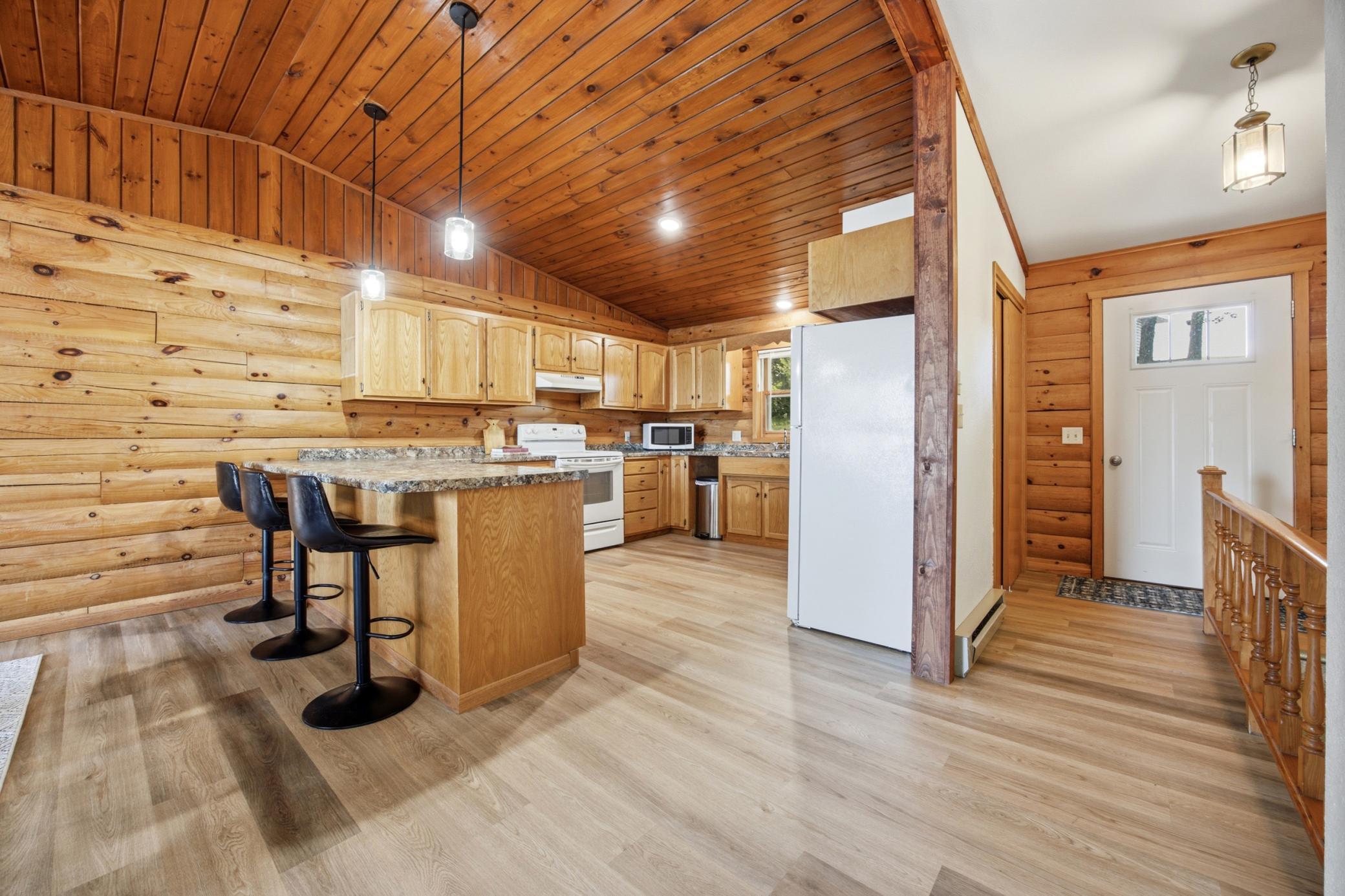 Ample kitchen storage and open peninsula seating
