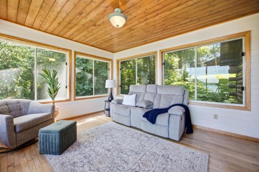 Sunroom with lots of natural light and private views