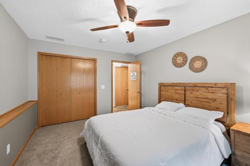 Just a few easy steps from the main living area, this thoughtfully positioned bedroom offers the perfect blend of privacy and convenience.