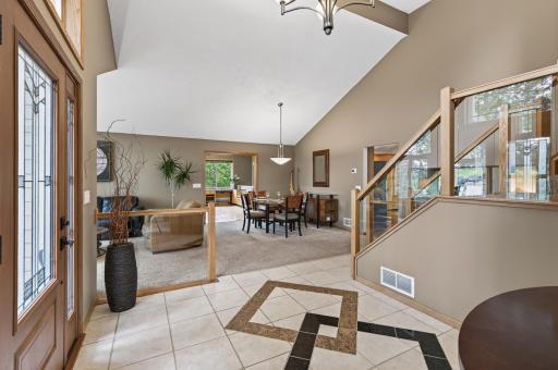 A warm welcome begins the moment you step through the front door, where quality craftsmanship and thoughtful updates immediately stand out.