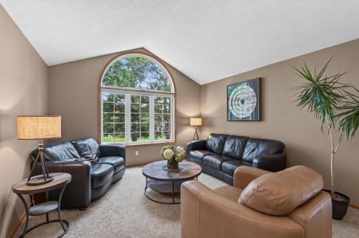 The perfect balance of comfort and elegance, this front living room provides a welcoming space for both everyday living and special occasions.