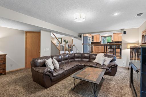 Open to the kitchen, this inviting space keeps conversations flowing while meals are prepared and memories are made.