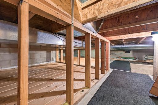 An expansive crawl space provides exceptional storage for seasonal dÃ©cor, totes, keepsakes, and everything you want tucked neatly out of sight.