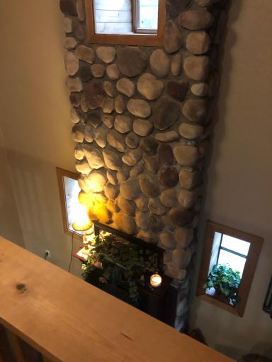 Two Story Field Stone Fireplace from Sleeping Loft