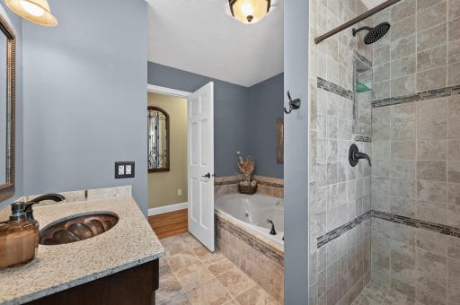 Full bath with jetted tub and tiled shower!
