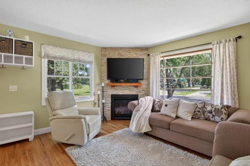 Stunning corner fireplace keeps you cozy on chilly evenings.