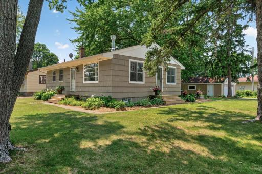 Beautiful landscaping, mature trees on a large corner lot!
